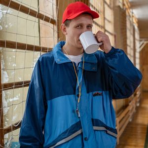 Professional instructor Snezhana Humeniuk smiling in her training gear.